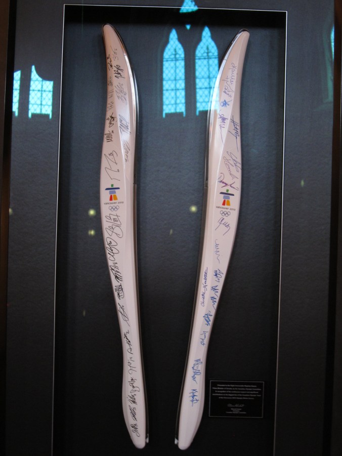 Olympic torches signed by Canada's gold medal winners