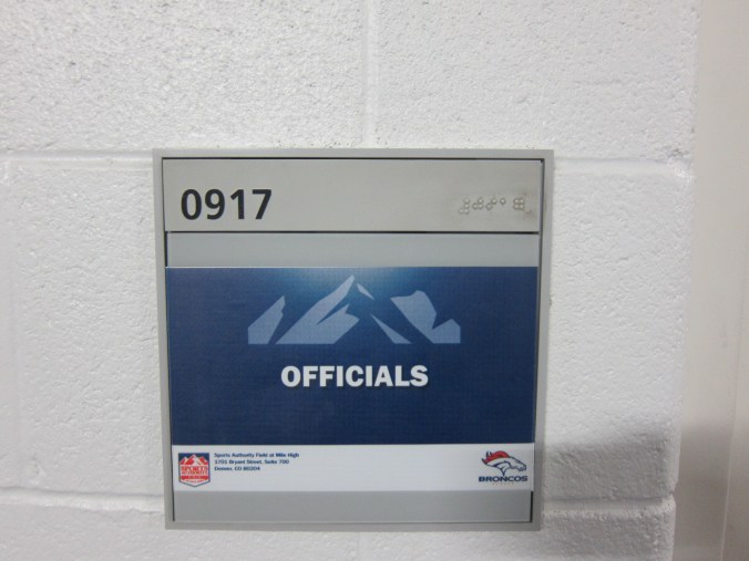 Officials' locker room sign