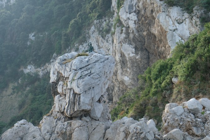 Statue of boy waving, isle of Capri