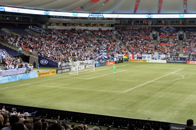Goalkeeper saluting the fans