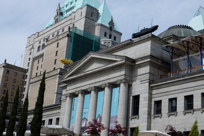 Four Boats Stranded: Black and Yellow by Ken Lum