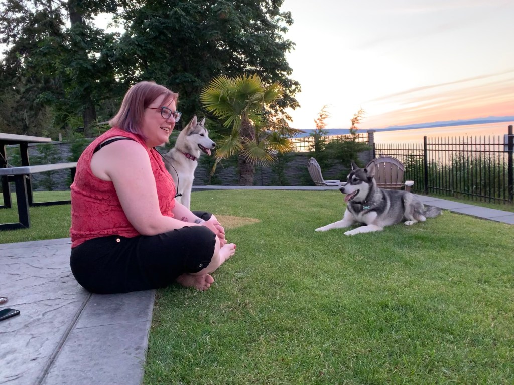 My wife with two dogs on vacation