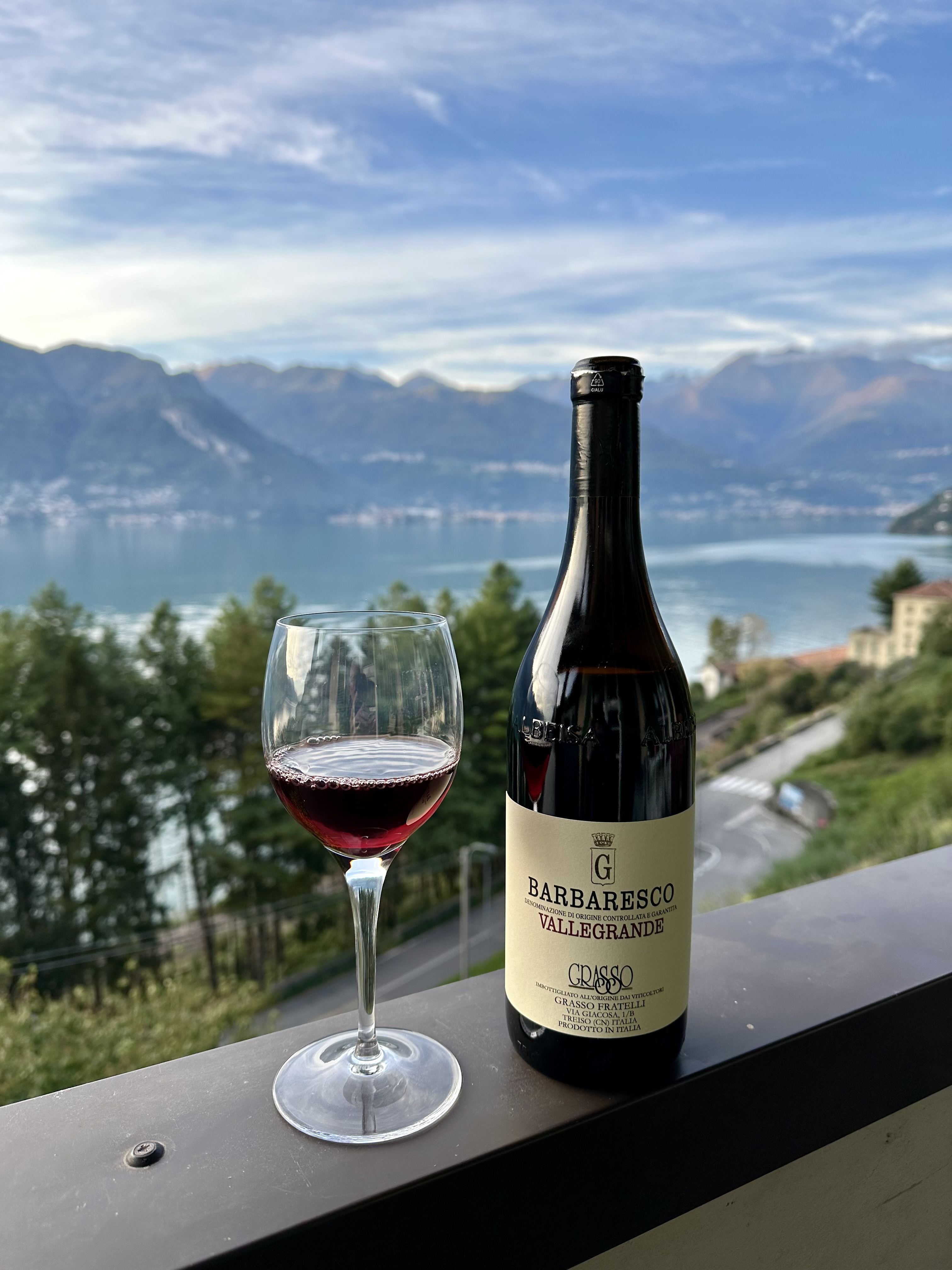 Drinking wine in Dorio, Italy